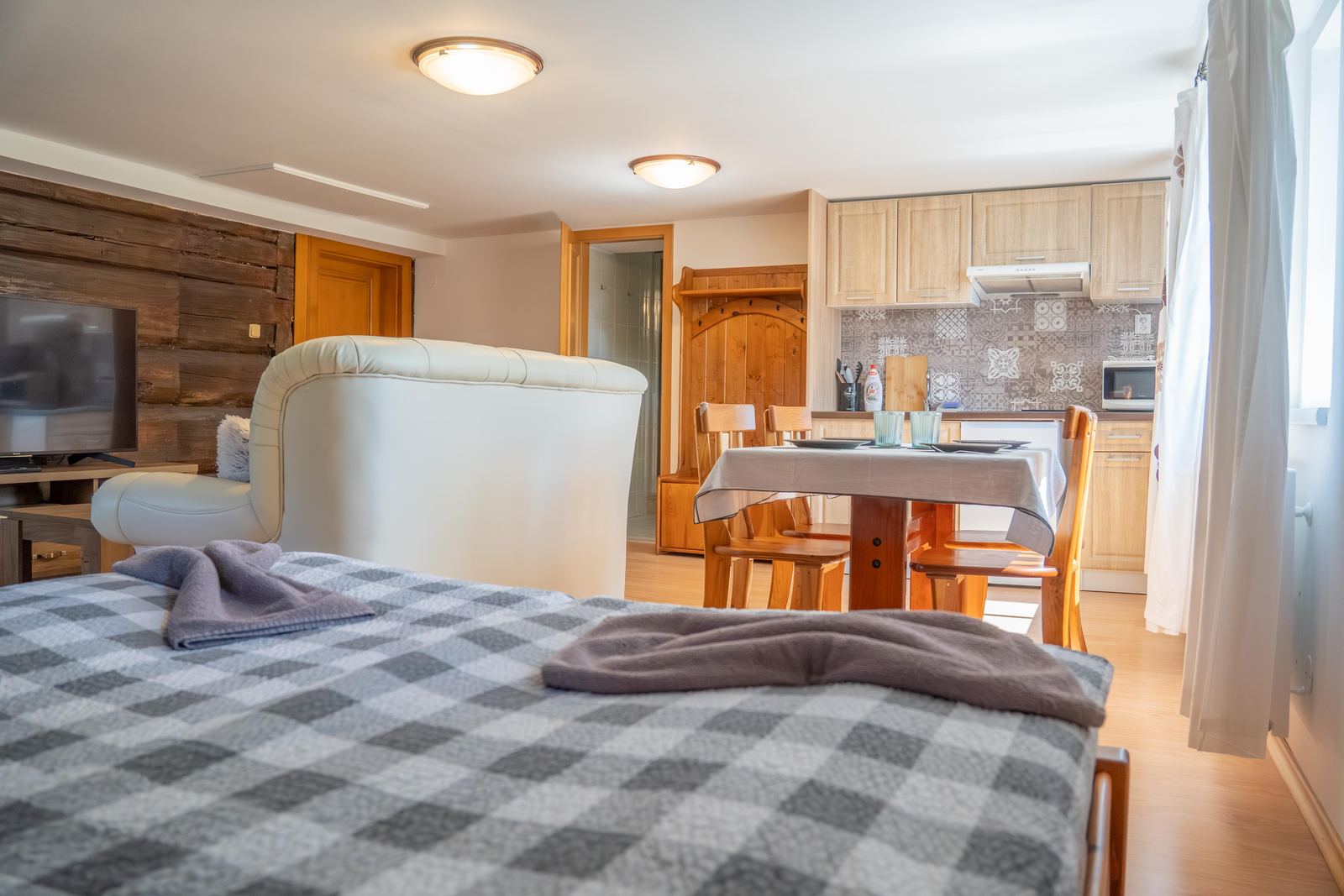 Apartmán s obývací částí a kuchyňským koutem